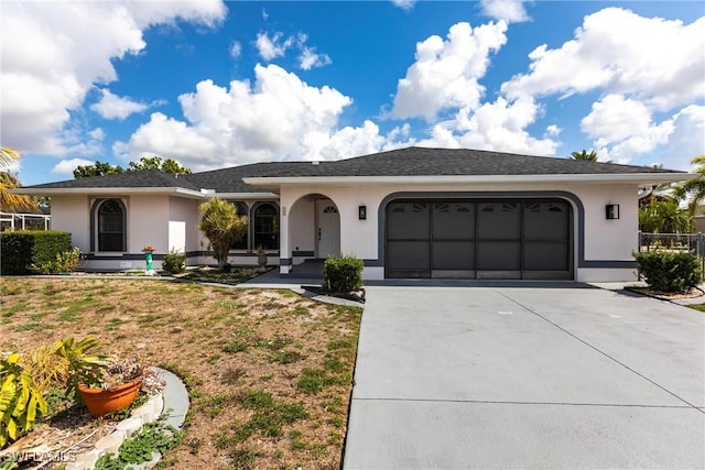 919 SE 16th St, Cape Coral, FL 33990 - ranch-style home featuring driveway, stucco siding, and a garage