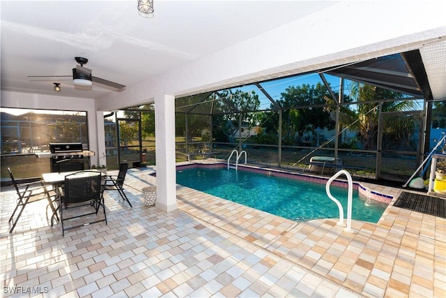 919 SE 16th St, Cape Coral, FL 33990 - outdoor pool with a patio, a ceiling fan, a grill, and glass enclosure
