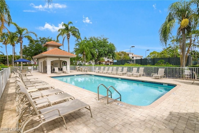 7505 Stoneybrook Dr Unit 746, Naples, FL 34112 - community pool featuring a patio area and fence