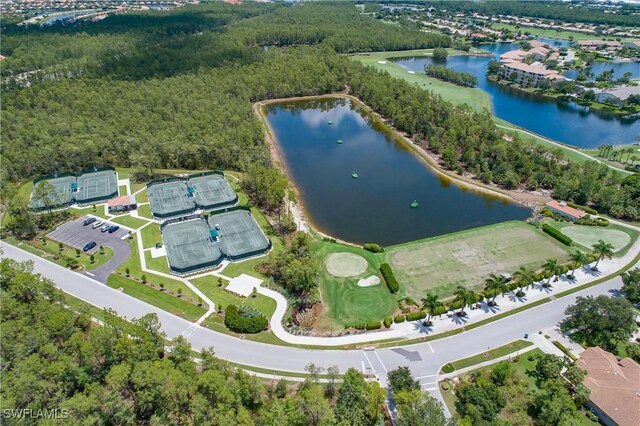 7505 Stoneybrook Dr Unit 746, Naples, FL 34112 - aerial view with a water view and a forest view