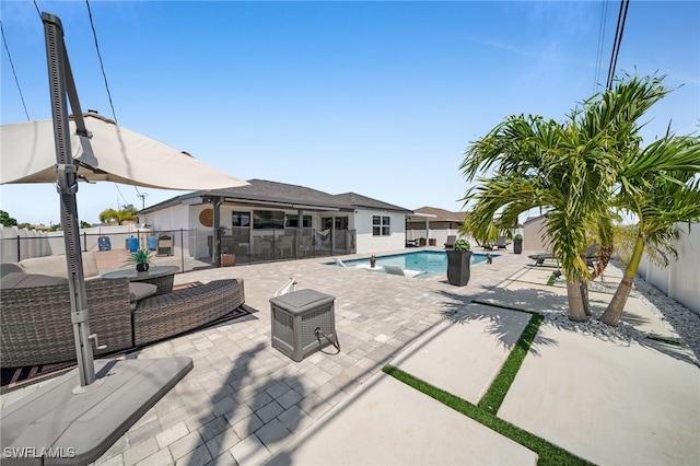 202 NE 16th Ter, Cape Coral, FL 33909 - view of swimming pool with a fenced in pool, a fenced backyard, and a patio area
