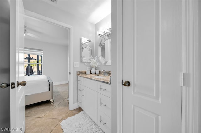 202 NE 16th Ter, Cape Coral, FL 33909 - bathroom featuring tile patterned floors and vanity