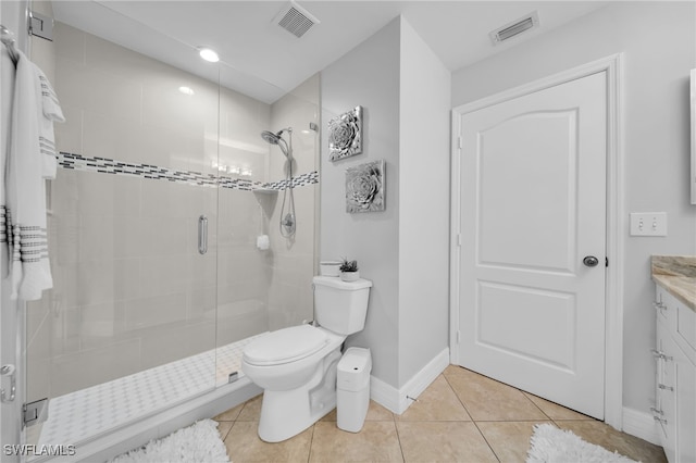 202 NE 16th Ter, Cape Coral, FL 33909 - full bathroom with visible vents, tile patterned flooring, a shower stall, baseboards, and toilet