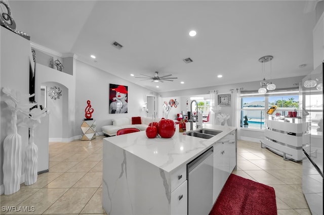 202 NE 16th Ter, Cape Coral, FL 33909 - kitchen featuring stainless steel dishwasher, light tile patterned floors, visible vents, and a sink