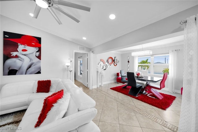 202 NE 16th Ter, Cape Coral, FL 33909 - living room with ceiling fan, recessed lighting, light tile patterned floors, vaulted ceiling, and ornamental molding