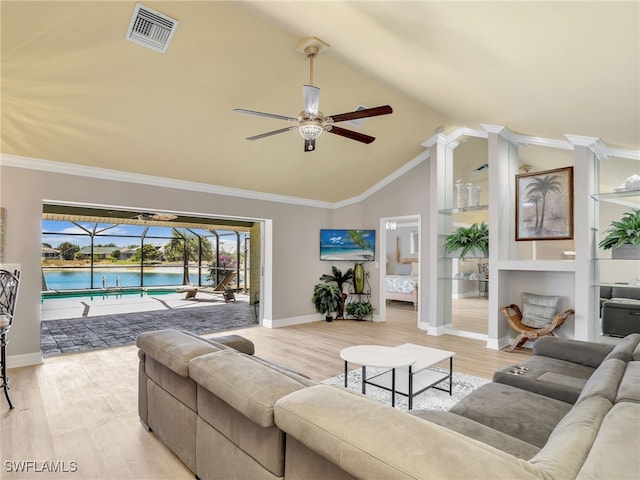 11526 Forest Mere Dr, Bonita Springs, FL 34135 - living room featuring a ceiling fan, light wood-style flooring, baseboards, visible vents, and vaulted ceiling