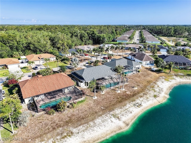 11526 Forest Mere Dr, Bonita Springs, FL 34135 - drone / aerial view featuring a water view, a residential view, and a view of trees