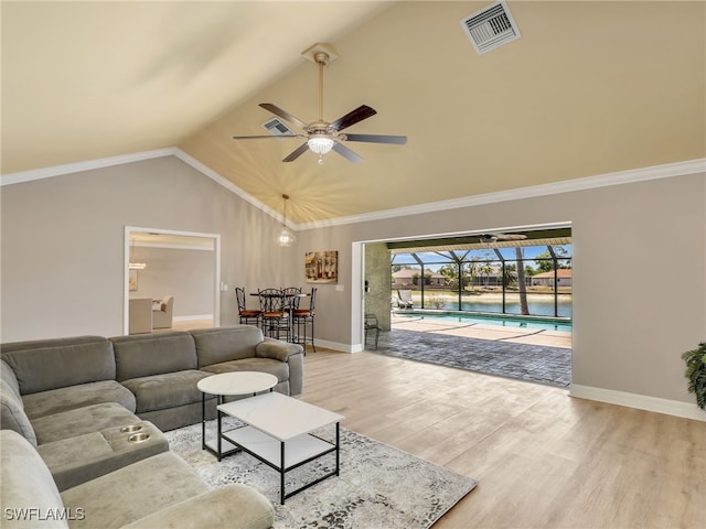 11526 Forest Mere Dr, Bonita Springs, FL 34135 - living area with light wood finished floors, a ceiling fan, high vaulted ceiling, visible vents, and baseboards