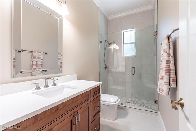full bathroom featuring crown molding, vanity, toilet, tile patterned floors, and a stall shower