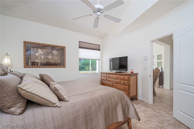 bedroom featuring vaulted ceiling and a ceiling fan