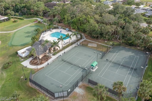 birds eye view of property with golf course view