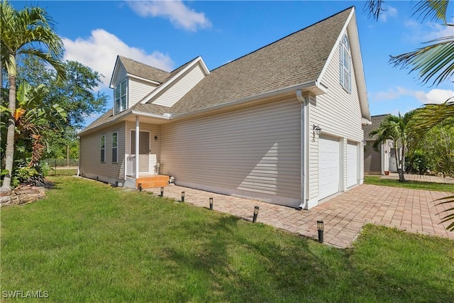 239 Leawood Cir, Naples, FL 34104 - view of side of home featuring a lawn and a shingled roof