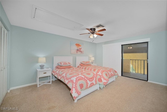 1400 Blue Point Ave Unit 202, Naples, FL 34102 - bedroom with attic access, carpet flooring, access to outside, ceiling fan, and baseboards