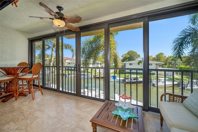 1400 Blue Point Ave Unit 202, Naples, FL 34102 - sunroom with a water view