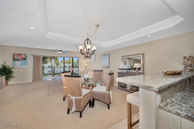 1400 Blue Point Ave Unit 202, Naples, FL 34102 - dining area with a raised ceiling, light colored carpet, recessed lighting, crown molding, and a chandelier