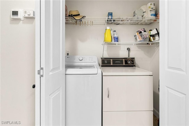 6308 Sugar Bush Ln Unit E, Fort Myers, FL 33908 - laundry room featuring washer and clothes dryer