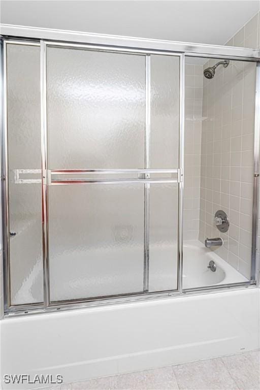 6308 Sugar Bush Ln Unit E, Fort Myers, FL 33908 - full bath featuring combined bath / shower with glass door and tile patterned floors