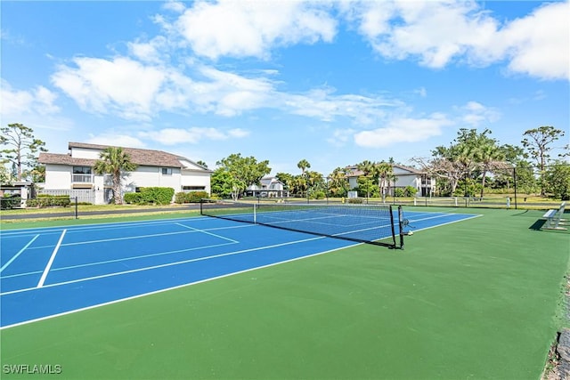 6308 Sugar Bush Ln Unit E, Fort Myers, FL 33908 - view of tennis court featuring fence