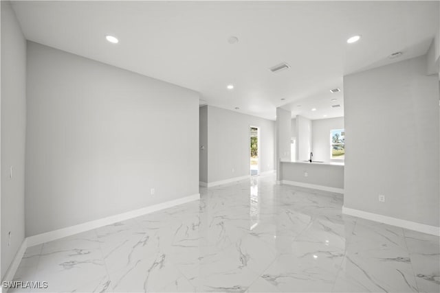 836 Clow St E, Lehigh Acres, FL 33974 - spare room featuring recessed lighting, baseboards, and visible vents