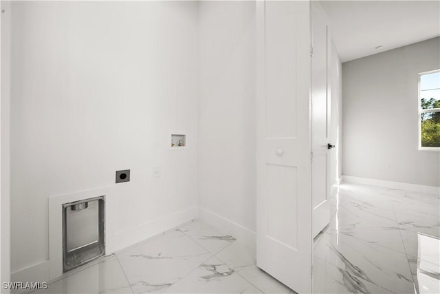 836 Clow St E, Lehigh Acres, FL 33974 - washroom featuring electric dryer hookup, marble look tiles, and washer hookup