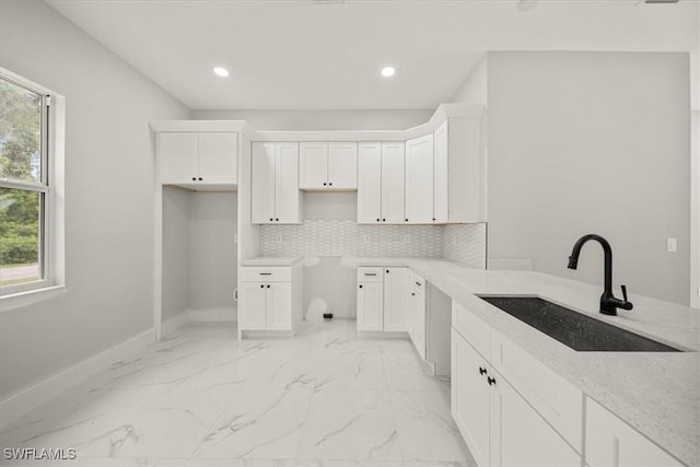 836 Clow St E, Lehigh Acres, FL 33974 - washroom with healthy amount of natural light, recessed lighting, and light marble finish floors