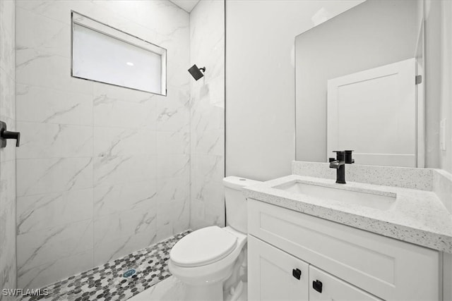 836 Clow St E, Lehigh Acres, FL 33974 - bathroom featuring vanity and a tile shower