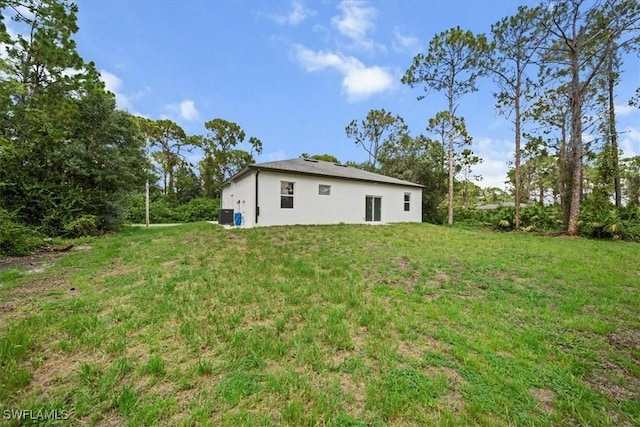 836 Clow St E, Lehigh Acres, FL 33974 - view of green lawn