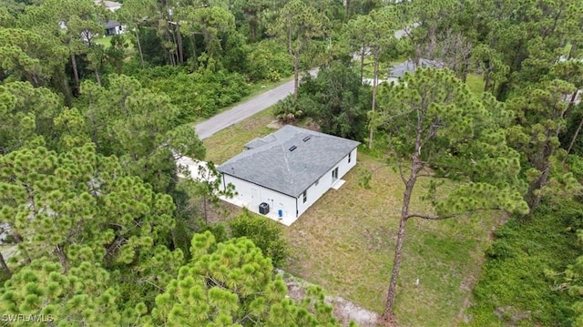 836 Clow St E, Lehigh Acres, FL 33974 - aerial overview of property's location with a forest