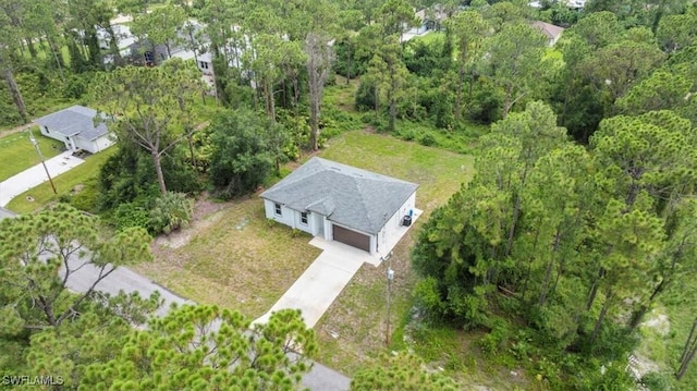 836 Clow St E, Lehigh Acres, FL 33974 - aerial overview of property's location featuring a heavily wooded area