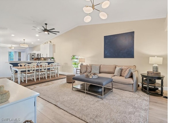 10225 Bismark Palm Way Unit 1626, Fort Myers, FL 33966 - living area with light wood-type flooring, a chandelier, lofted ceiling, a ceiling fan, and recessed lighting