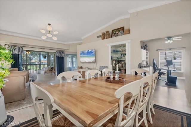 10225 Bismark Palm Way Unit 1626, Fort Myers, FL 33966 - dining space featuring lofted ceiling, crown molding, light wood finished floors, and ceiling fan
