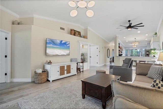 10225 Bismark Palm Way Unit 1626, Fort Myers, FL 33966 - living area featuring ornamental molding, light wood-style flooring, a ceiling fan, lofted ceiling, and recessed lighting