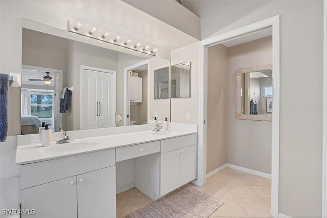 10225 Bismark Palm Way Unit 1626, Fort Myers, FL 33966 - full bath with double vanity, tile patterned floors, connected bathroom, and ceiling fan