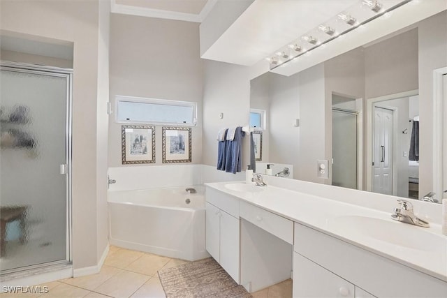 10225 Bismark Palm Way Unit 1626, Fort Myers, FL 33966 - full bathroom featuring a stall shower, double vanity, a bath, tile patterned floors, and crown molding