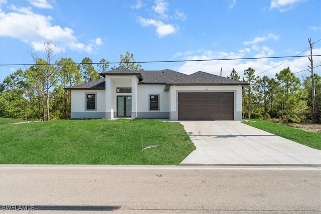 203 E 10th St, Lehigh Acres, FL 33972 - prairie-style house with stucco siding, a garage, driveway, a front yard, and a shingled roof