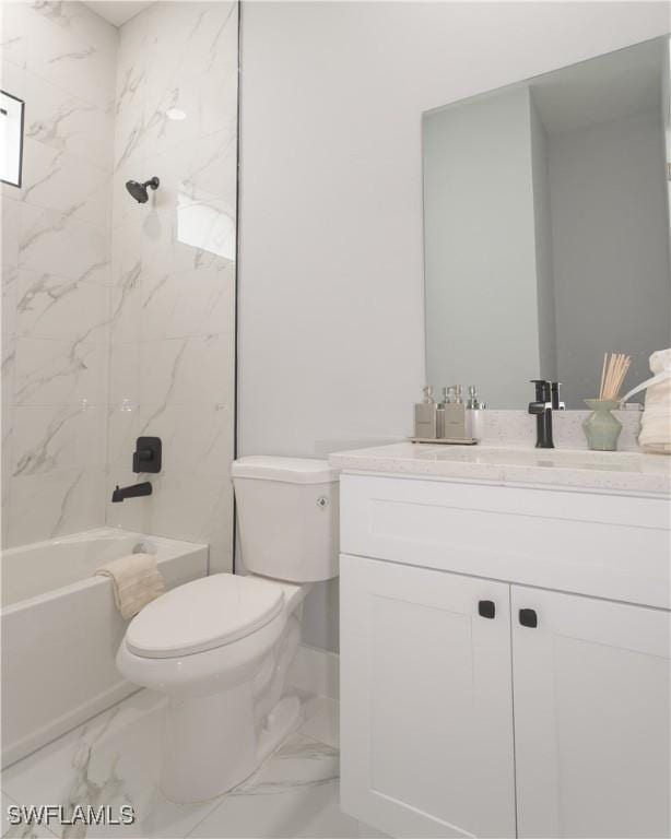 203 E 10th St, Lehigh Acres, FL 33972 - full bath with marble look tile flooring, toilet, vanity, and washtub / shower combination