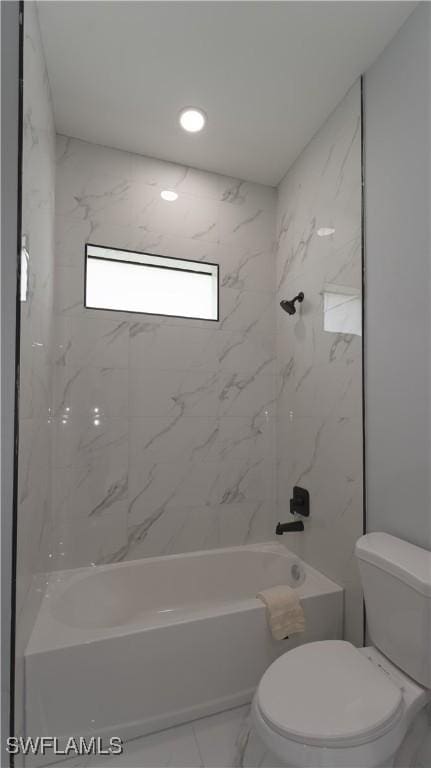203 E 10th St, Lehigh Acres, FL 33972 - full bathroom with toilet and washtub / shower combination