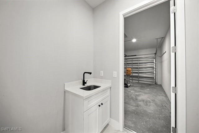 203 E 10th St, Lehigh Acres, FL 33972 - garage featuring a sink