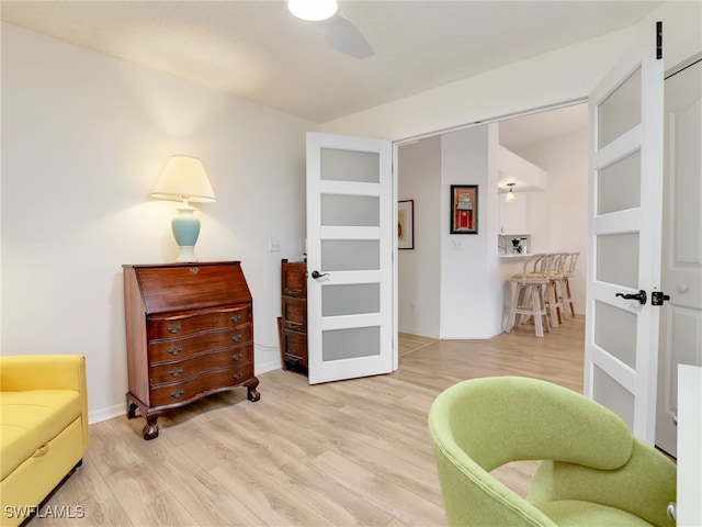 935 New Waterford Dr Unit F204, Naples, FL 34104 - living area featuring ceiling fan and wood finished floors