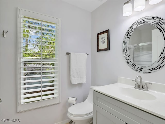 935 New Waterford Dr Unit F204, Naples, FL 34104 - full bathroom with toilet, a shower with door, and vanity