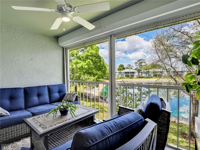 935 New Waterford Dr Unit F204, Naples, FL 34104 - sunroom featuring a ceiling fan, a water view, and outdoor lounge area
