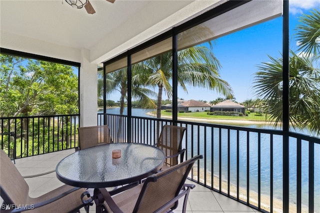 sunroom with a water view