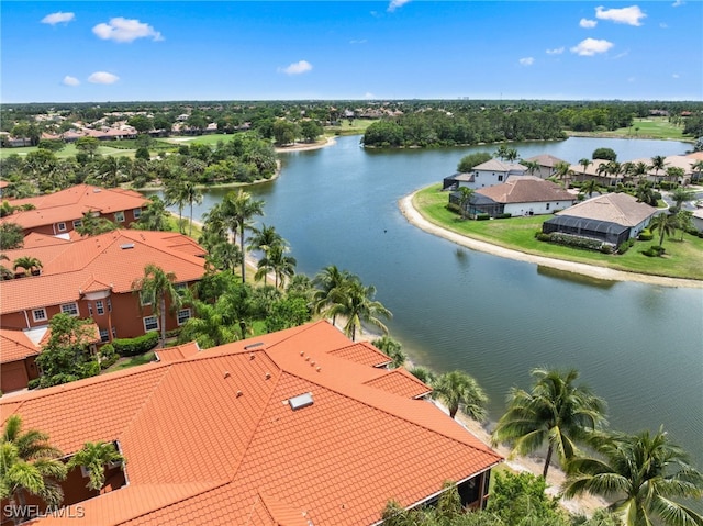 birds eye view of property with a water view and a residential view
