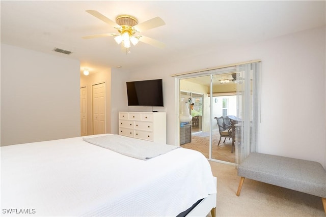 bedroom with visible vents, a ceiling fan, access to outside, and light carpet