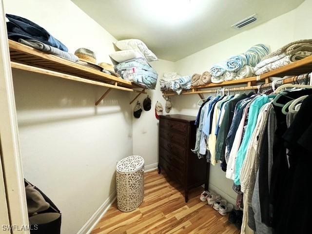 2743 1st St Unit 305, Fort Myers, FL 33916 - walk in closet featuring visible vents and wood finished floors