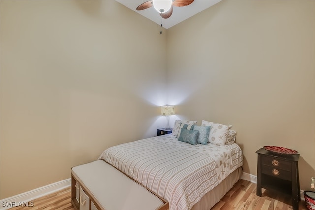2743 1st St Unit 305, Fort Myers, FL 33916 - bedroom featuring baseboards, ceiling fan, light wood-style flooring, and lofted ceiling
