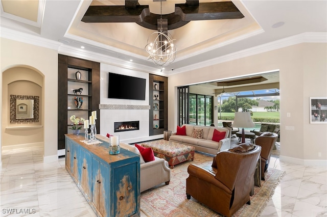 living room featuring baseboards, marble finish floor, ornamental molding, a glass covered fireplace, and built in features
