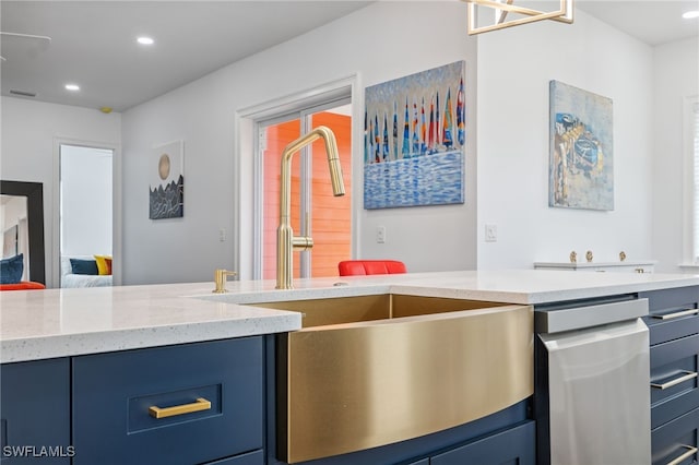8605 Inwood Dr, Hudson, FL 34667 - kitchen featuring blue cabinets, stainless steel dishwasher, recessed lighting, and light stone countertops