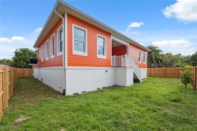8605 Inwood Dr, Hudson, FL 34667 - view of side of home with a fenced backyard