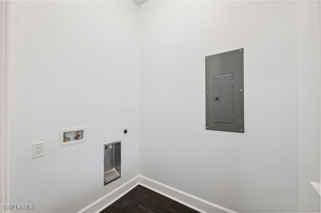 8605 Inwood Dr, Hudson, FL 34667 - washroom featuring electric panel, hookup for a washing machine, dark wood-style flooring, and hookup for an electric dryer